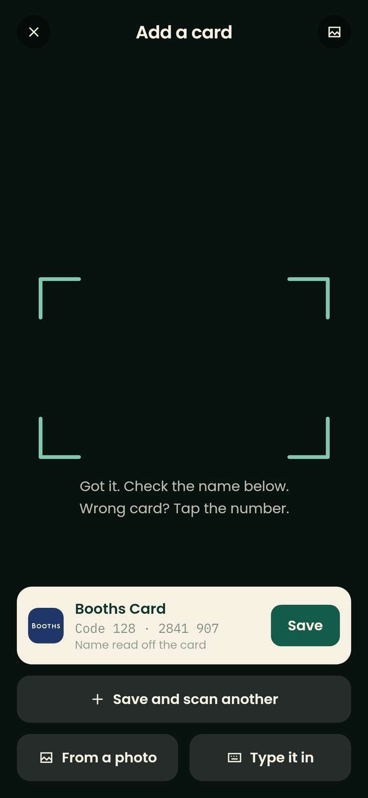 CardJar's scanner having locked onto a card, with a result panel reading Booths Card, Code 128 and the seven-digit number, noting the name was read off the card, beside a Save button